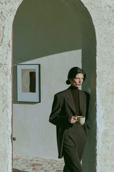 Elegant Woman in Archway Photography Poster. poster