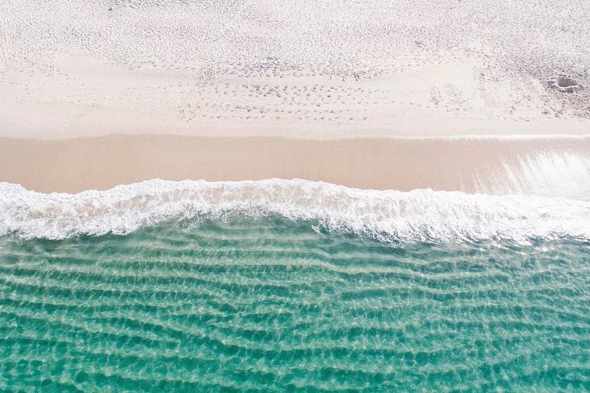 Drone view ocean waves washing. poster — photography art