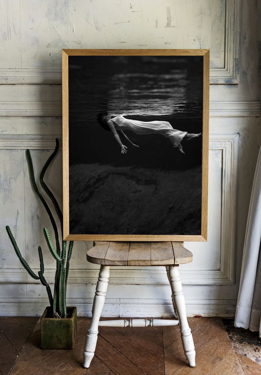 Underwater view woman, wearing long. room preview