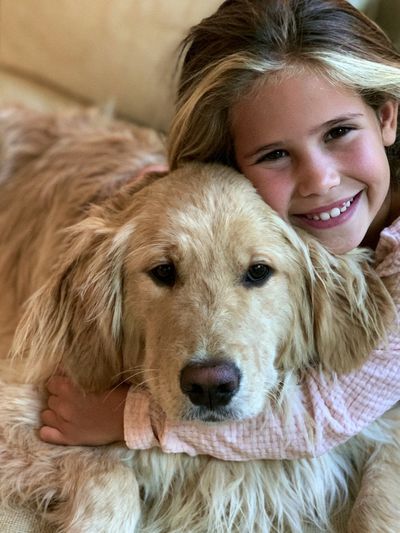 Girl and Golden Retriever Portrait Poster. poster