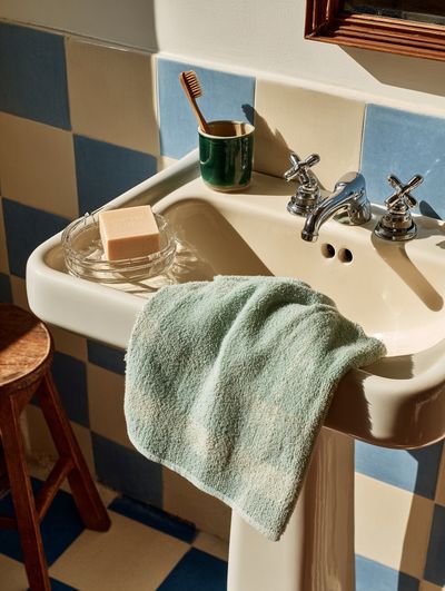 Sunlit Vintage Bathroom Sink Poster. poster