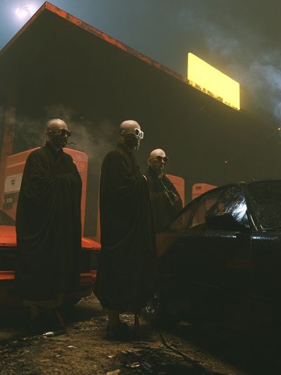 Masked Figures at Gas Station Poster. poster