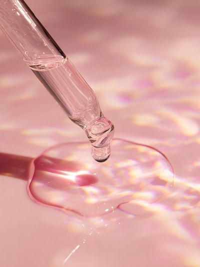 Pink Serum Drop Photography Poster. poster