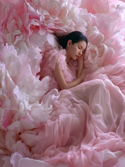 Sleeping Woman in Pink Petals Poster.