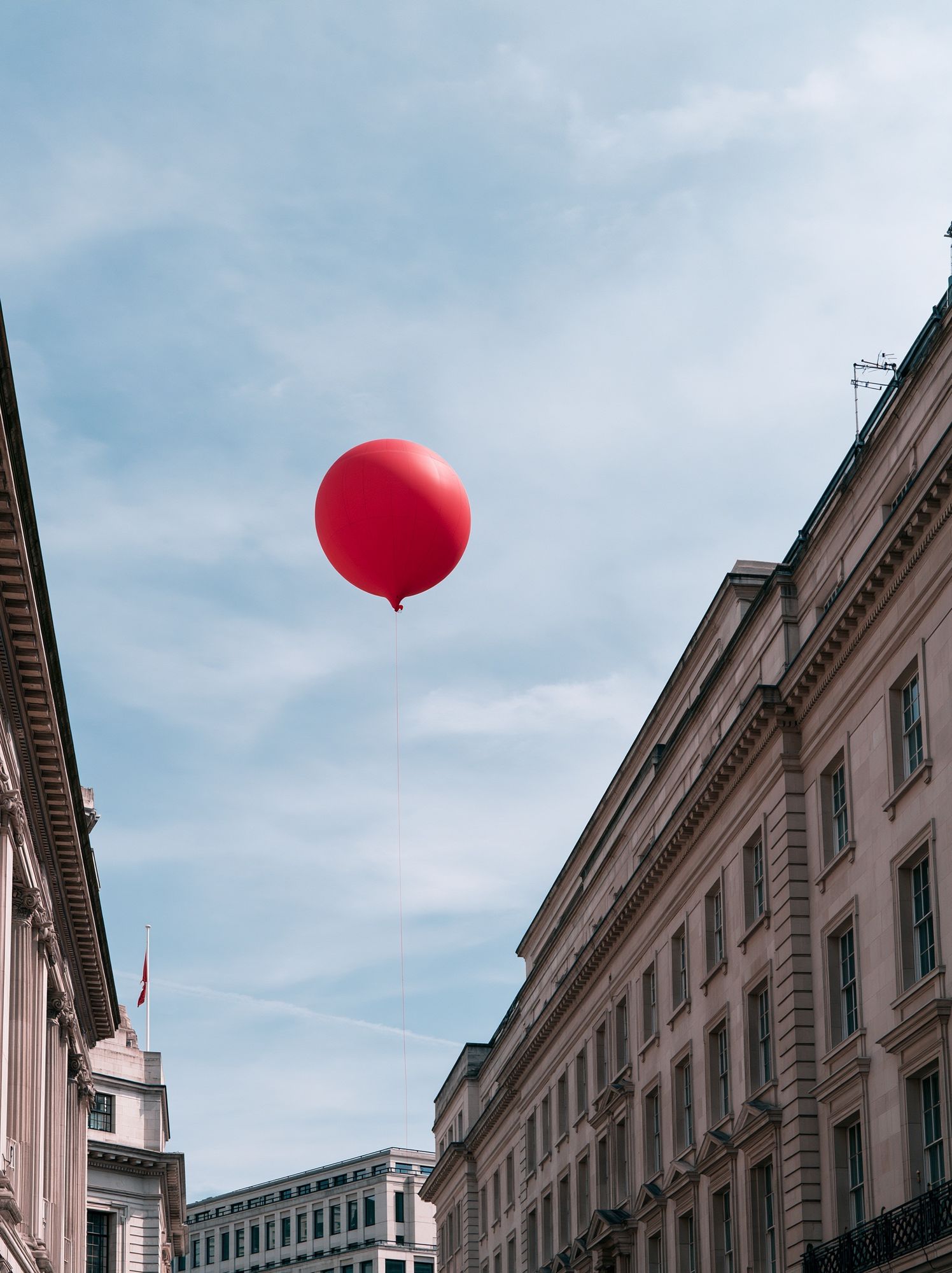 Red Balloon Cityscape Photography Poster. poster detail