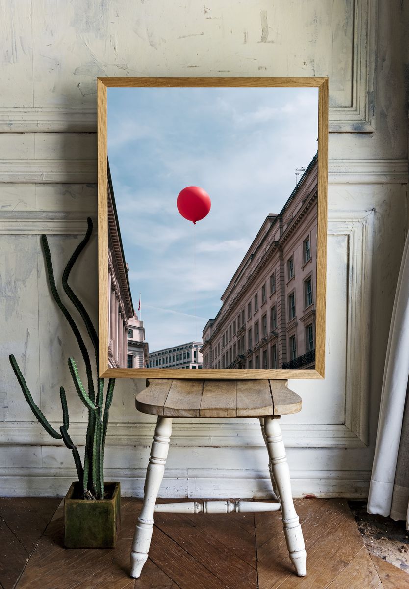 Red Balloon Cityscape Photography Poster. room preview