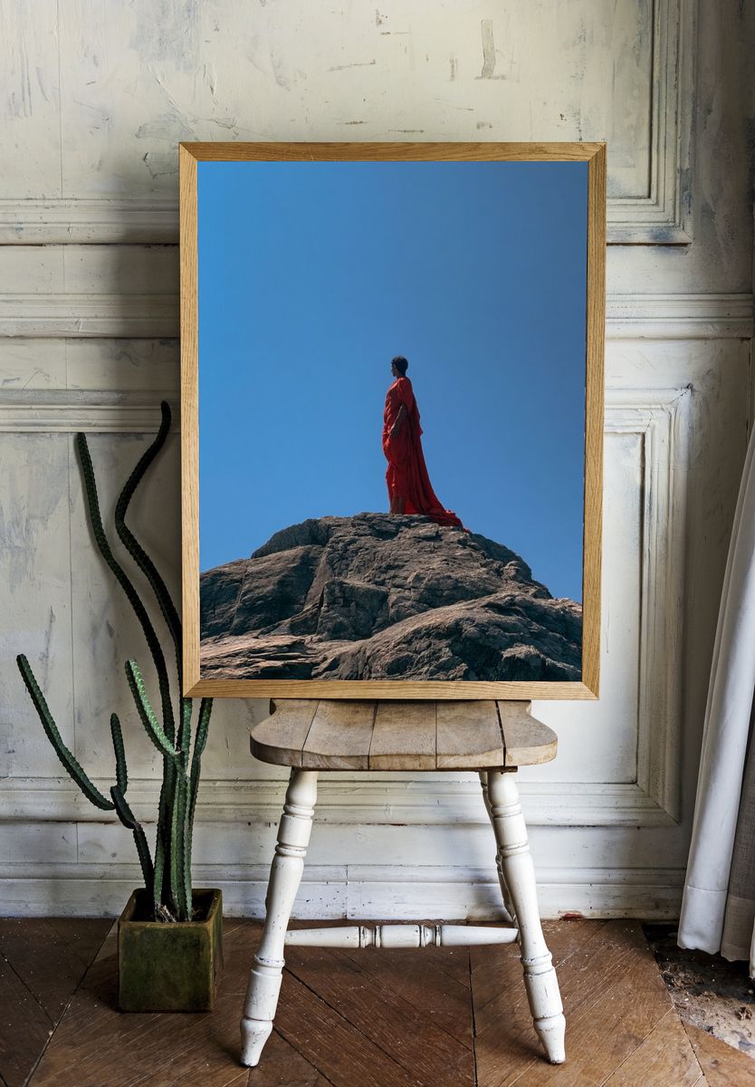 Red Figure on Rock Photography Poster. — room view 1