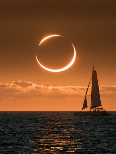 Solar Eclipse Sailboat Photography Poster.