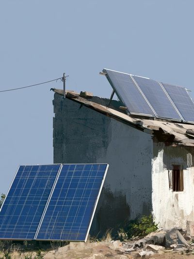 Solar Panels on Rural House Poster.