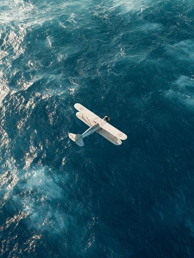 Seaplane Over Ocean Poster. poster