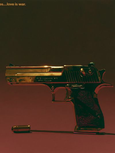 Golden Pistol Typography Poster.