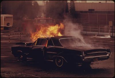 Burning Classic Car — Vintage Print. poster