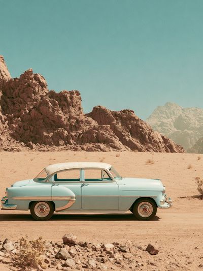 Vintage Car in Desert Poster.