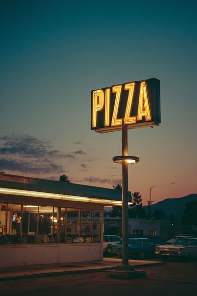 Neon Pizza Diner at Dusk Poster