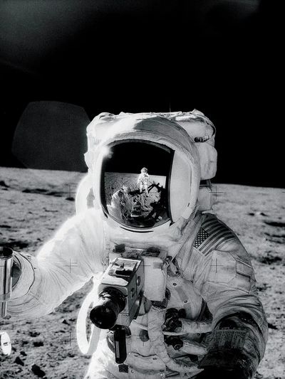 Astronaut Alan Bean holds Special. poster
