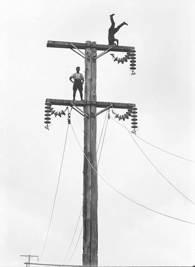 Vintage Linemen at Work — Black-White Print. poster