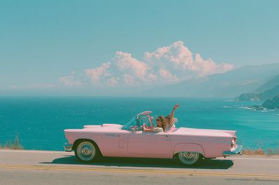 Pink Convertible Coastal Drive Poster.
