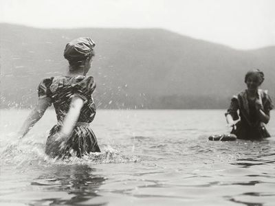 Women Playing in Water — Vintage Photography Print. poster