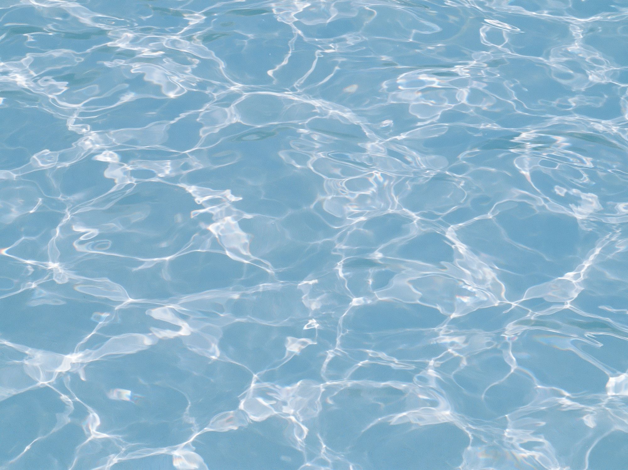 Sunlit Water Ripples Photography Poster. poster detail
