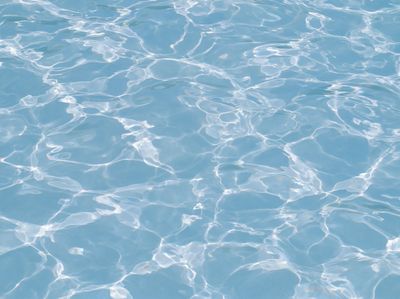 Sunlit Water Ripples Photography Poster.