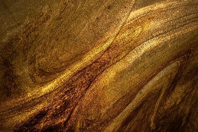 Dark gold paint textured background. poster print