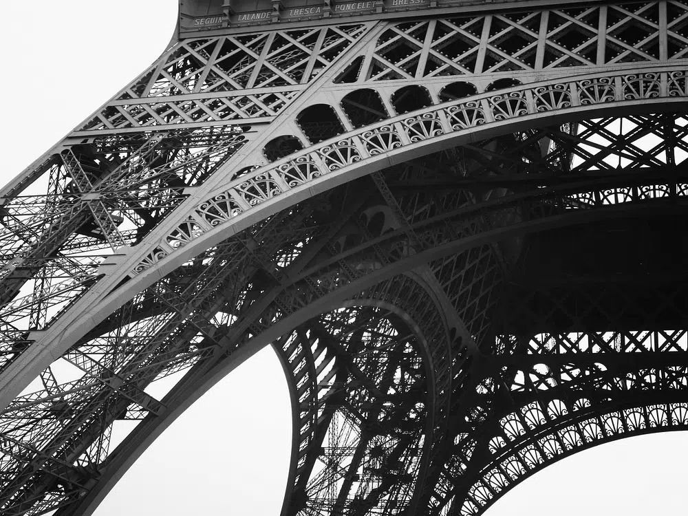 Bottom Eiffel Tower cloudy day. poster — architecture art
