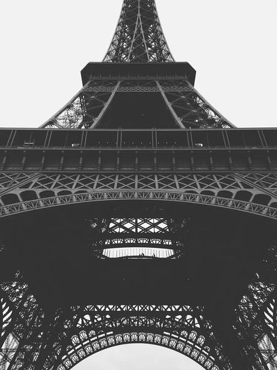 black-and-white shot bottom Eiffel Tower.