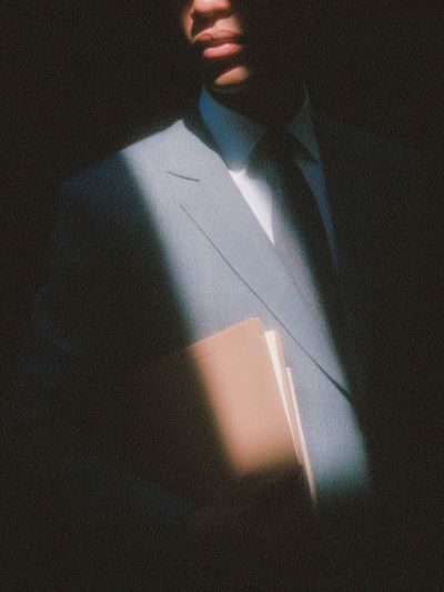 Businessman in Shadow — Photography Print. poster