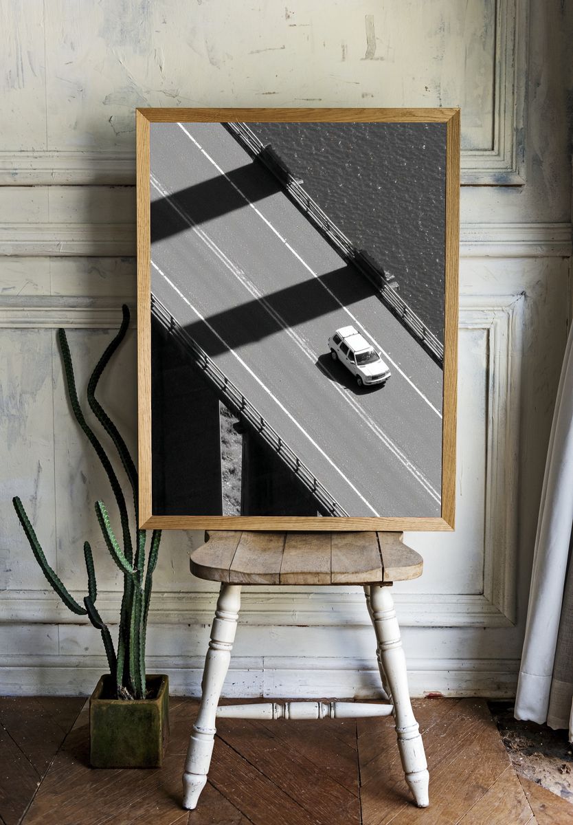 Car on Bridge — Black-White Photography Poster. — room view 1