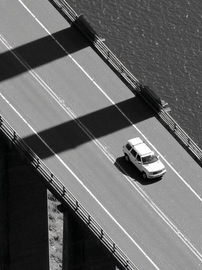Car on Bridge — Black-White Photography Poster. poster