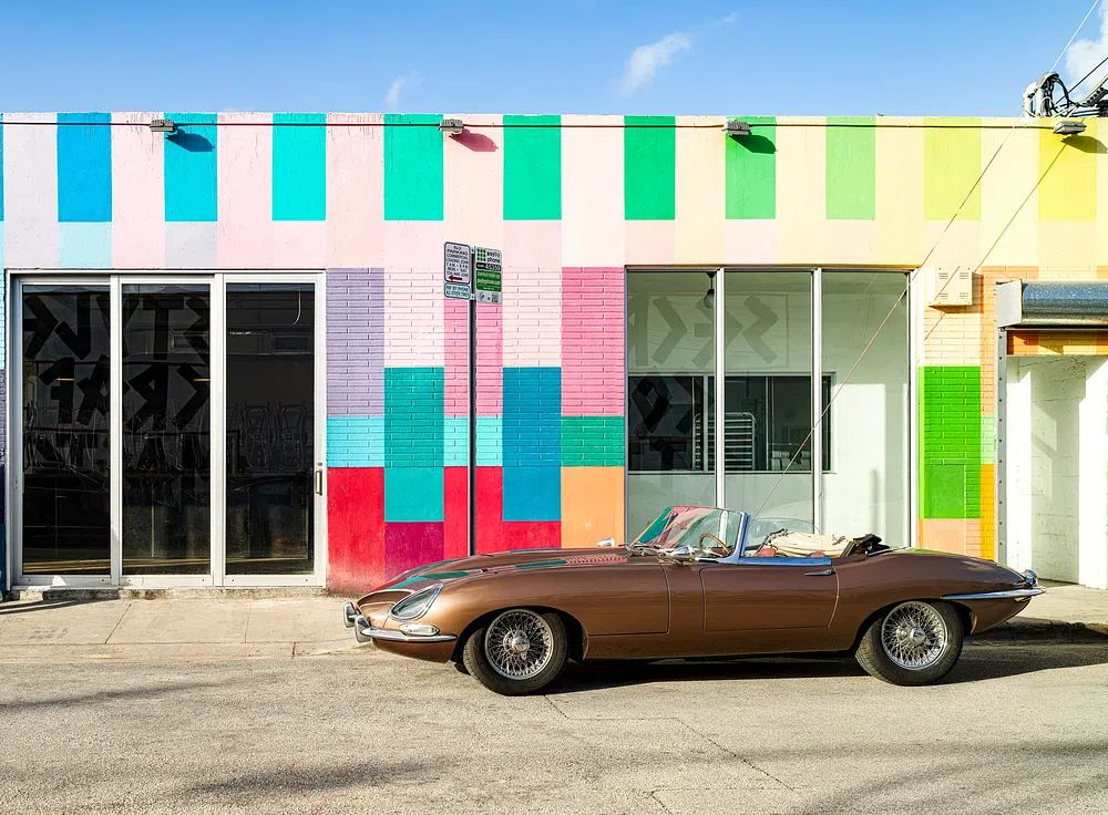 Classic Car Against Colorful Wall Poster. poster — photography art