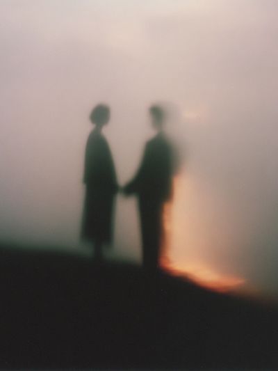 Silhouetted Couple at Sunset — Photography Print. poster print