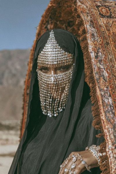 Elegant Woman in Traditional Attire — Photography Print. poster