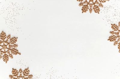Festive golden snowflakes frame design. poster
