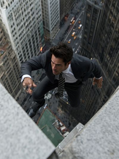 Man Scaling Skyscraper Action Poster.