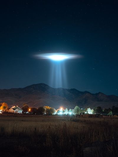UFO Beam Over Mountains Poster
