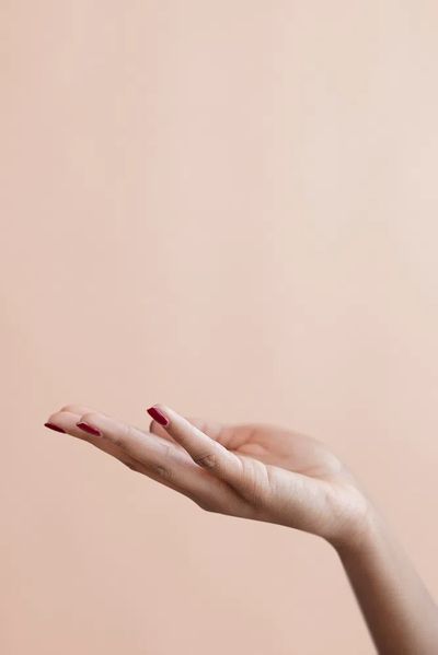Female hand beige background. poster print