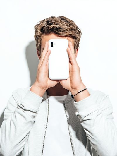 Young Man with Phone — Photography Print. poster