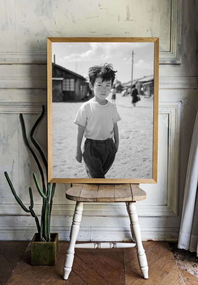 Boy in Village Street Photography Poster. — room view 1
