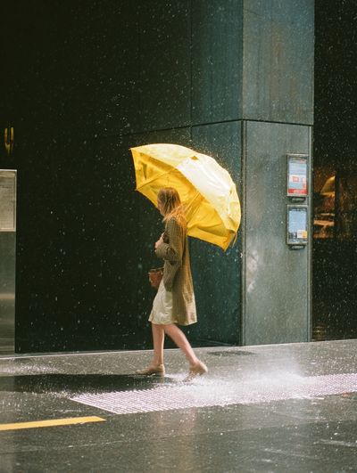 Woman with Yellow Umbrella — Photography Print. poster print