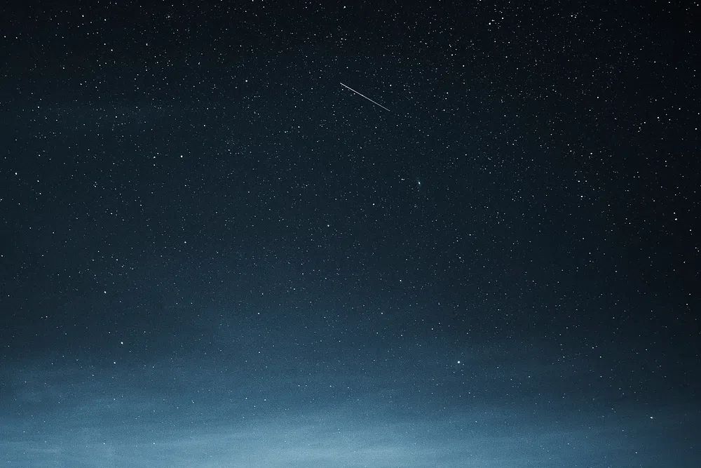 Shooting star dark blue sky. poster detail