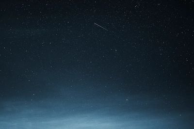 Shooting star dark blue sky. poster print