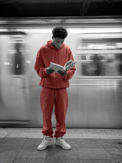 Subway Reader Street Photography Poster. poster